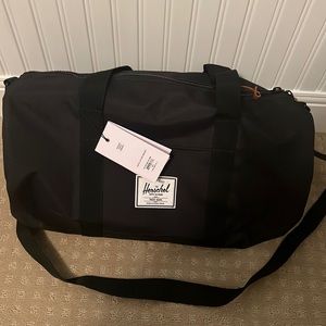 The Herschel Mid Volume Black Bag